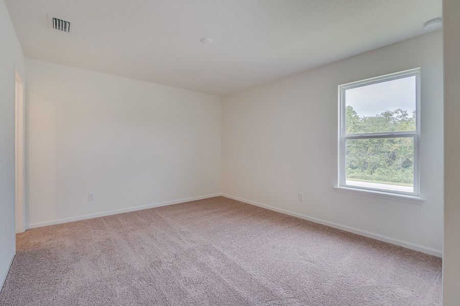 Spacious, unfurnished interior of a new home in Orchard Park Townhomes, St. Augustine (Image 7).