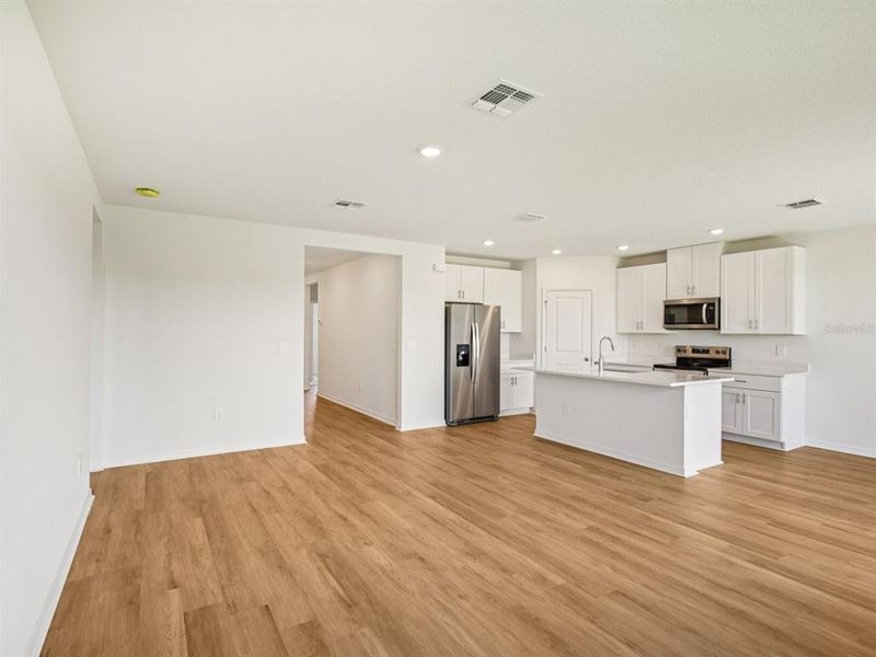 Spacious, unfurnished interior of a new home in The Reserve at Van Oaks, Auburndale (Image 13).