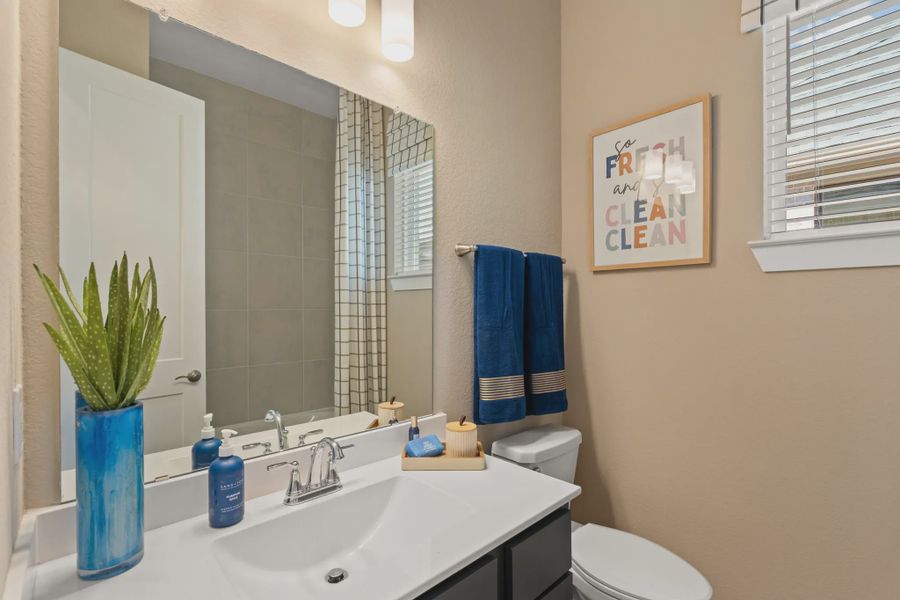 Representative furnished interior of a home built from the Middleton by Chesmar Homes in Brookewater 45's, Rosenberg (Image 6).