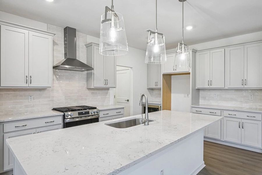 Kitchen featuring the AW Collection® Milan - Chic gray finishes and smooth surfaces shine. Kitchen featuring the AW Collection® Milan - Chic gray finishes and smooth surfaces shine.
