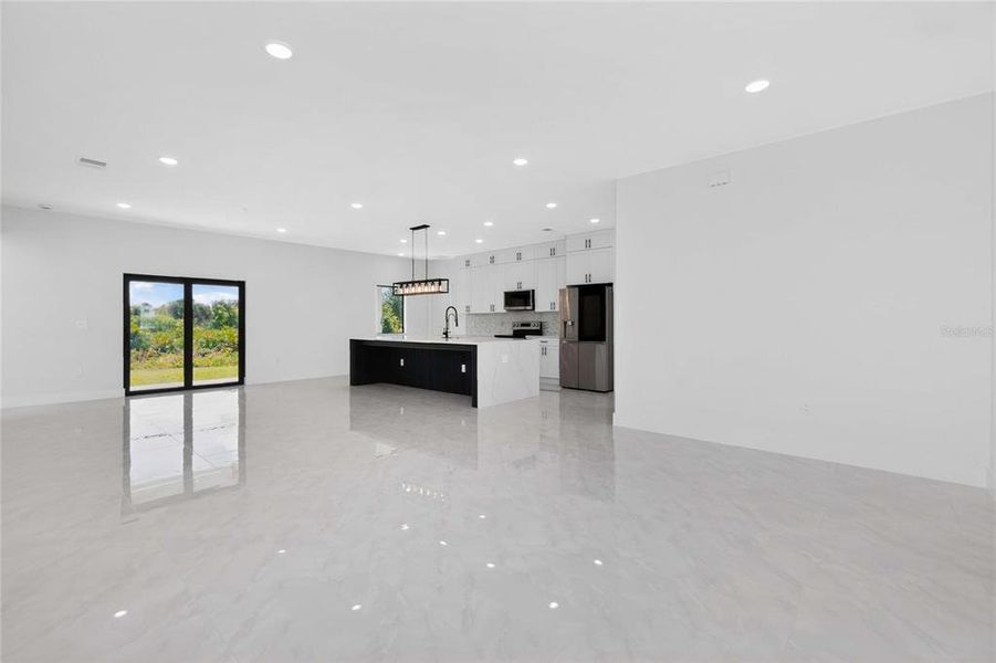 Spacious, unfurnished interior of a new home in , Port Charlotte (Image 54).