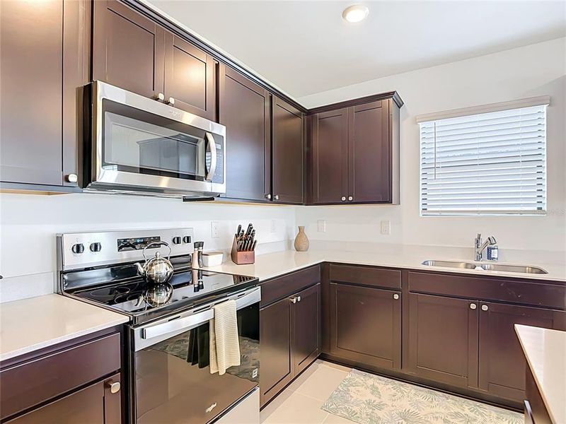Furnished interior view inside a new home in Caloosa Cove, Labelle (Image 39).