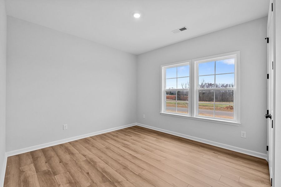 Spacious, unfurnished interior of a new home in Lilah Grove, Summerfield (Image 28).