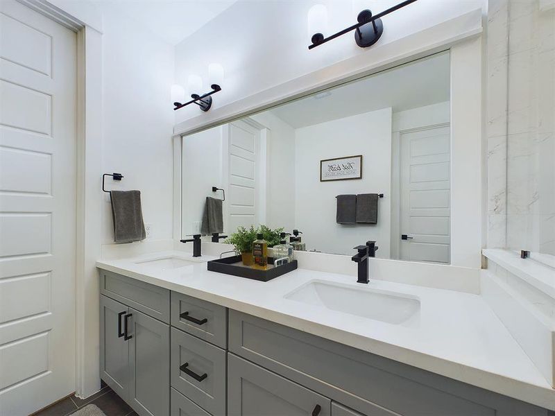 Beautiful Primary Bath with Quartz double sink vanity top and soft close drawers and doors.