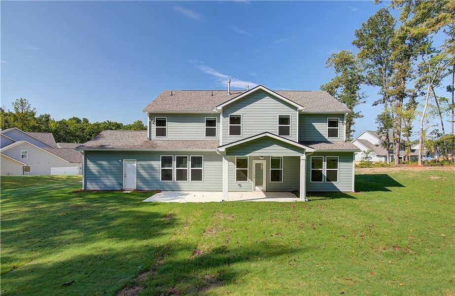 Front exterior of a new home in , Senoia, GA, highlighting curb appeal (Image 15). Front exterior of a new home in , Senoia, GA, highlighting curb appeal (Image 15).