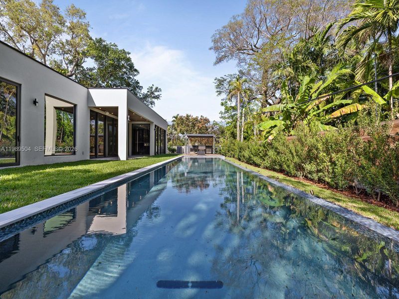 Exterior details and patio area of a home in , South Miami (Image 20).