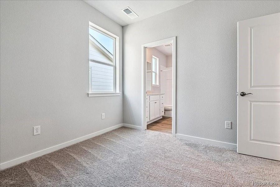 Spacious, unfurnished interior of a new home in Floret Collection at Alder Creek, Parker (Image 7).
