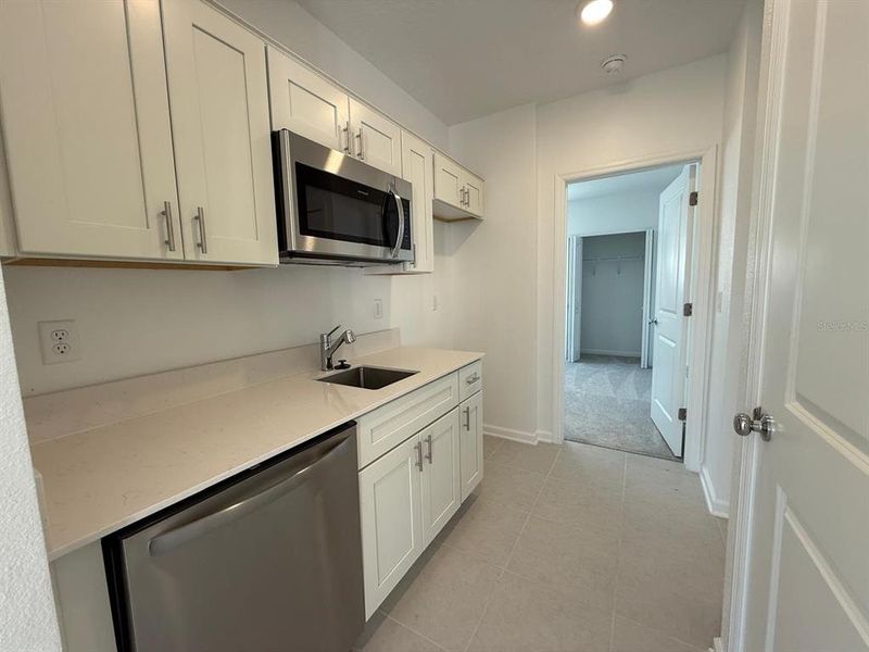 Furnished interior view inside a new home in , Kissimmee (Image 32).