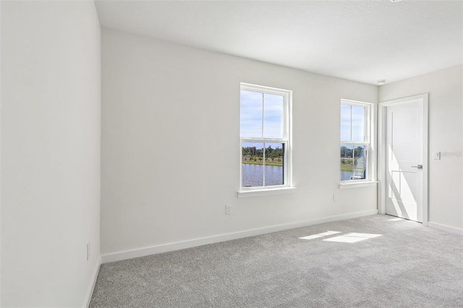Spacious, unfurnished interior of a new home in Grasslands West, Lakeland (Image 25).