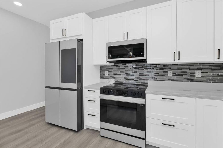 Furnished interior view inside a new home in , Punta Gorda (Image 11).