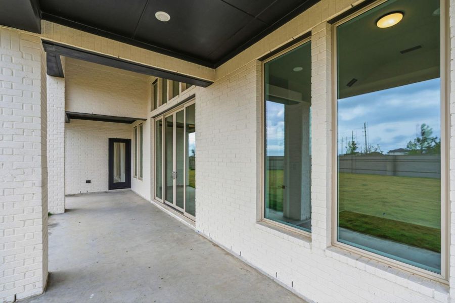 Exterior details and patio area of a home in , Cypress (Image 3).