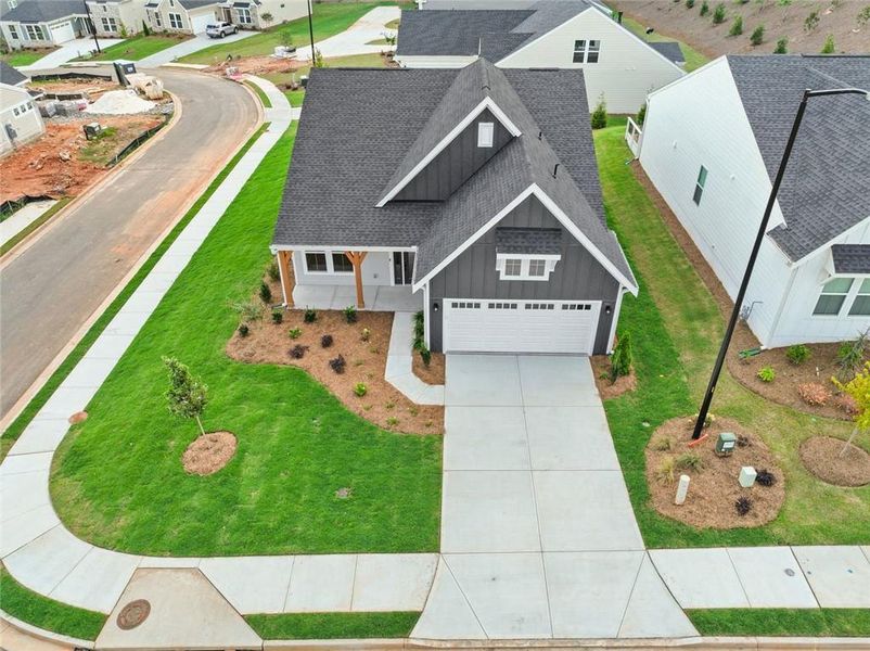 Front exterior of a new home in Easton Park, Dallas, GA, highlighting curb appeal (Image 1). Front exterior of a new home in Easton Park, Dallas, GA, highlighting curb appeal (Image 1).