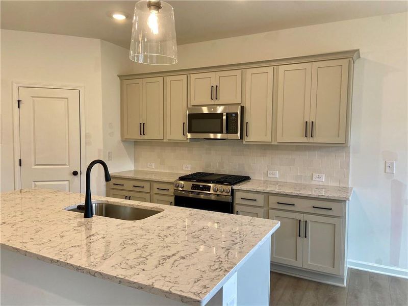 Furnished interior view inside a new home in Eastlyn Crossing, Flowery Branch (Image 8).