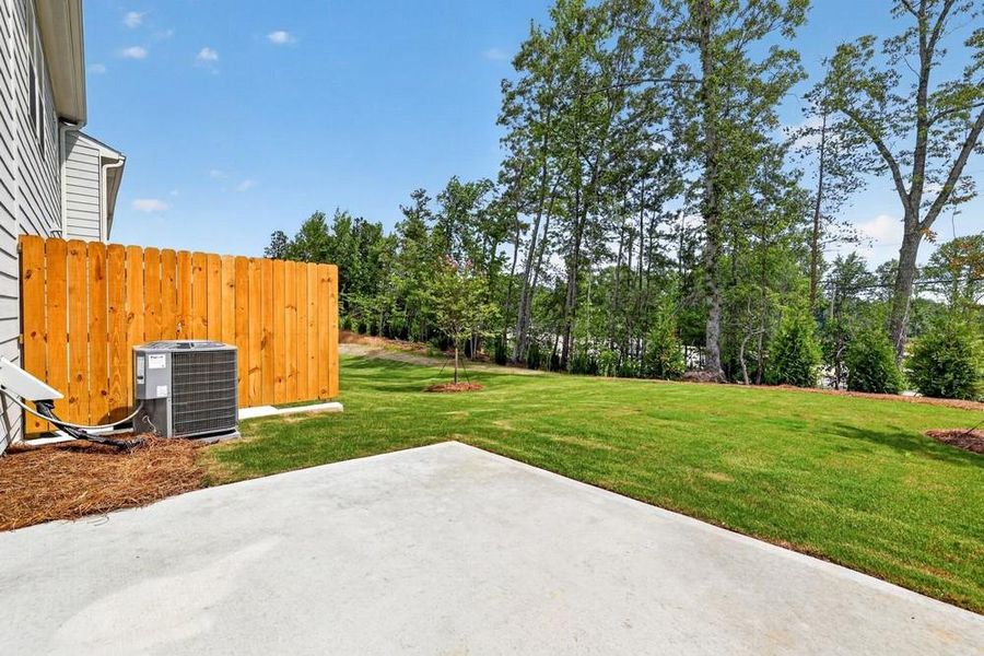 Exterior details and patio area of a home in Weatherfield, Buford (Image 4).