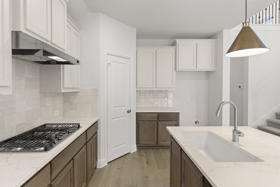 Furnished interior view inside a new home in The Reserve at Spiritas Ranch, Little Elm (Image 8).