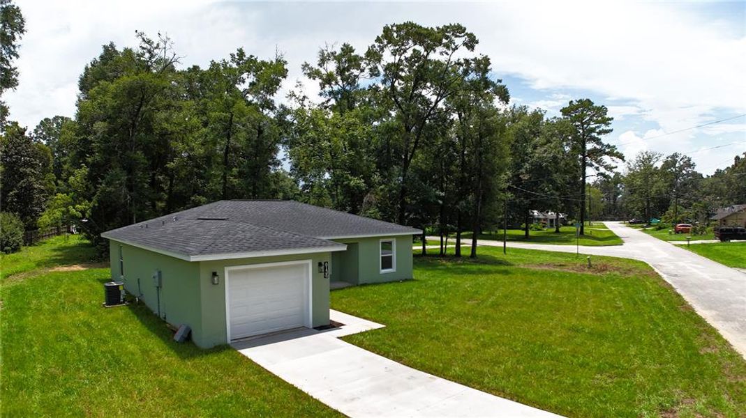 Front exterior of a new home in , Ocala, FL, highlighting curb appeal (Image 23). Front exterior of a new home in , Ocala, FL, highlighting curb appeal (Image 23).