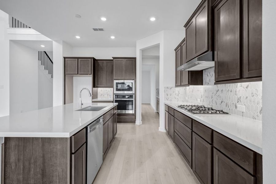 Furnished interior view inside a new home in Avalon at Friendswood 70s, Friendswood (Image 15).