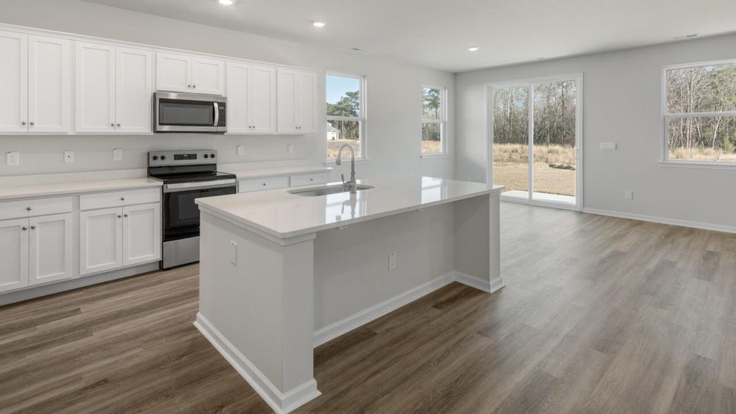 Representative furnished interior of a home built from the HARBOR OAK by D.R. Horton in Indigo Preserve, Leland (Image 8).