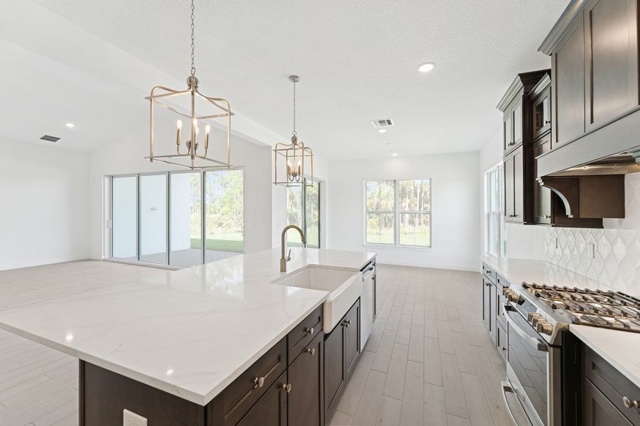 Kitchen with white apron-front sink