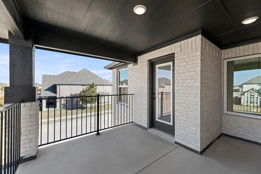 Exterior details and patio area of a home in Valencia on The Lake, Little Elm (Image 3). Exterior details and patio area of a home in Valencia on The Lake, Little Elm (Image 3).