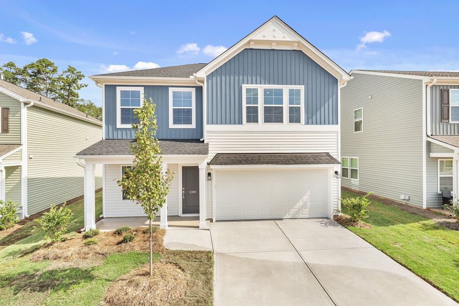 Front exterior of a new home in Mayfair Village, Spartanburg, SC, highlighting curb appeal (Image 1). Front exterior of a new home in Mayfair Village, Spartanburg, SC, highlighting curb appeal (Image 1).