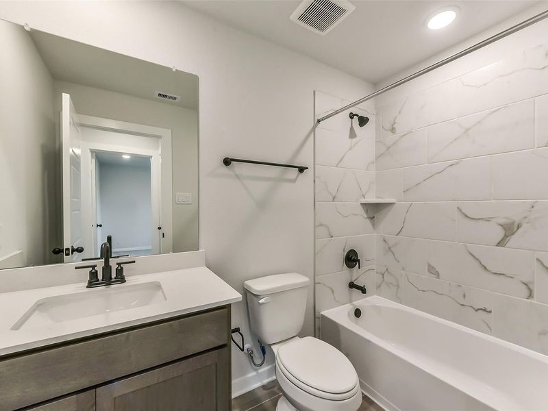 Furnished interior view inside a new home in Sundance Cove, Crosby (Image 37).