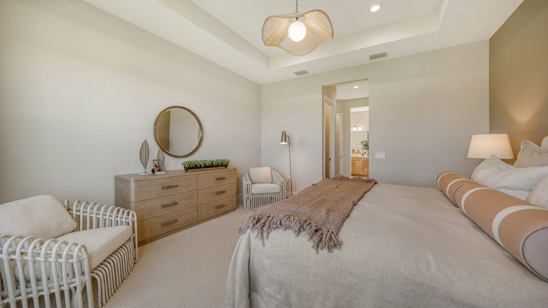 Furnished interior view inside a new home in SkySail Real Estate and Homes for Sale in Naples, FL - Neal Communities, Naples (Image 13).