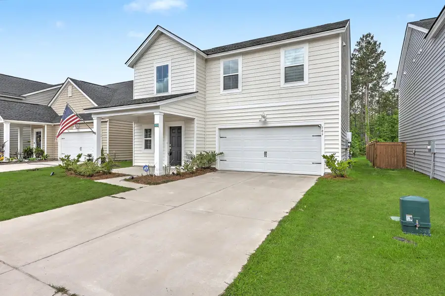 Front exterior of a new home in , Summerville, SC, highlighting curb appeal (Image 2).