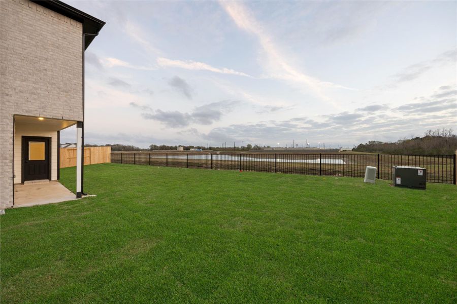 Exterior details and patio area of a home in , Manvel (Image 25). Exterior details and patio area of a home in , Manvel (Image 25).
