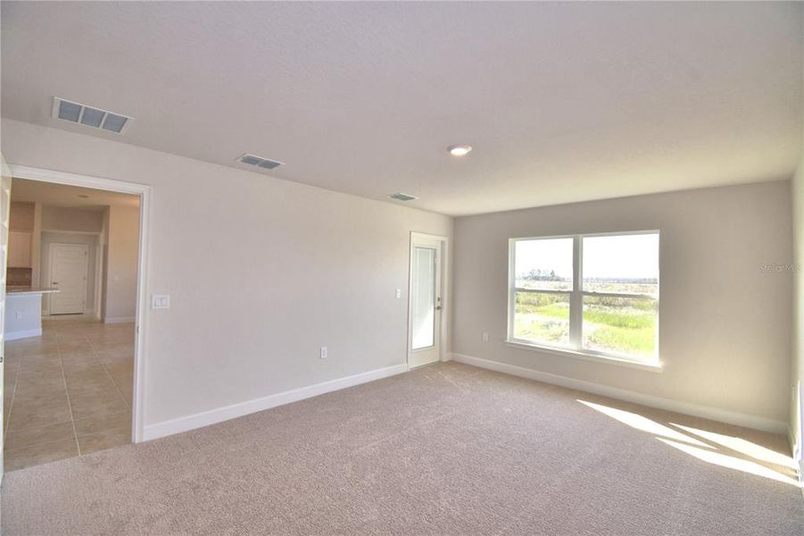 Spacious, unfurnished interior of a new home in Cadence Crossing, Auburndale (Image 30).