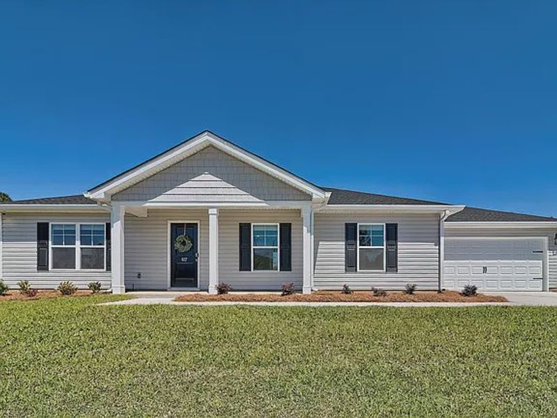 Front exterior of a new home in Amber Hill, West Columbia, SC, highlighting curb appeal (Image 1). Front exterior of a new home in Amber Hill, West Columbia, SC, highlighting curb appeal (Image 1).