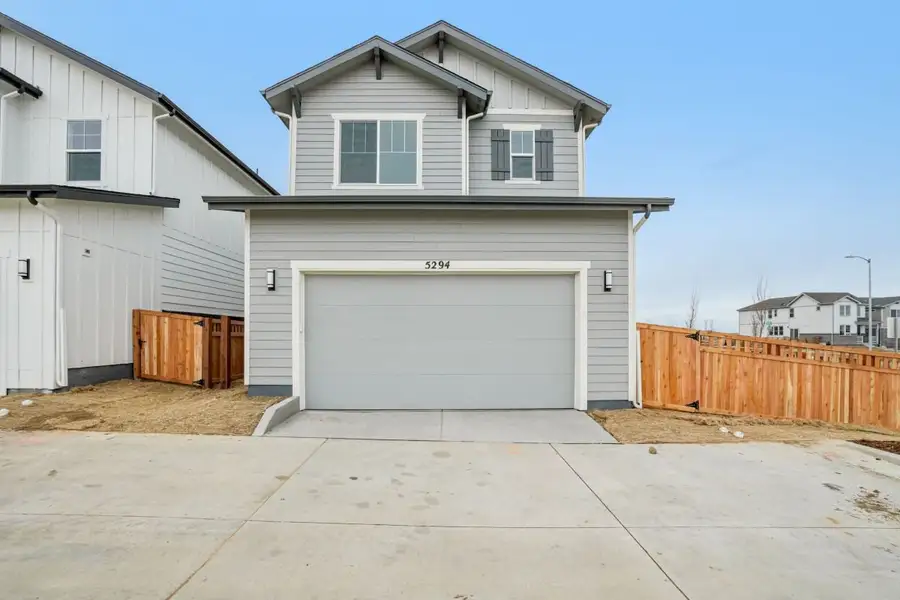 Front exterior of a new home in Windler Wildflower, Aurora, CO, highlighting curb appeal (Image 2). Front exterior of a new home in Windler Wildflower, Aurora, CO, highlighting curb appeal (Image 2).