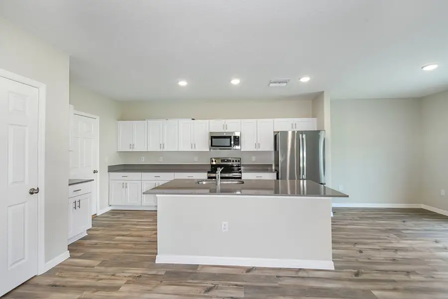 Furnished interior view inside a new home in Scenic Terrace, Haines City (Image 4).