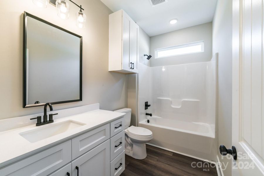 Secondary Bathroom: ALL Pics are of Previous Builds and are For Visual Purposes Only. We have built this plan with many different added upgrades and add-on finishes for the Exterior and Interior. Final Price TBD based on the added cost of buyers' selected upgrades and finishes.