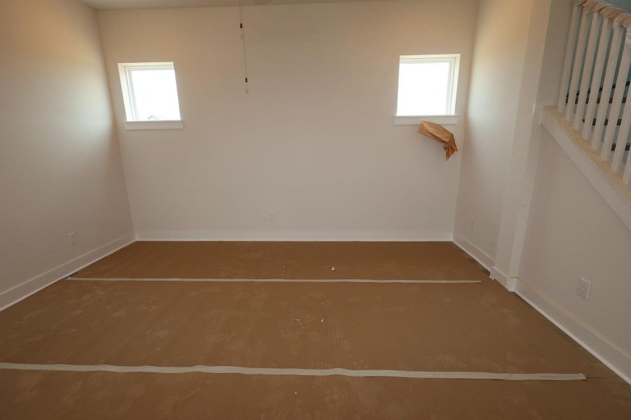 In-progress construction of a new home in Elyson - Grove Row Collection, Katy, TX (Image 7).