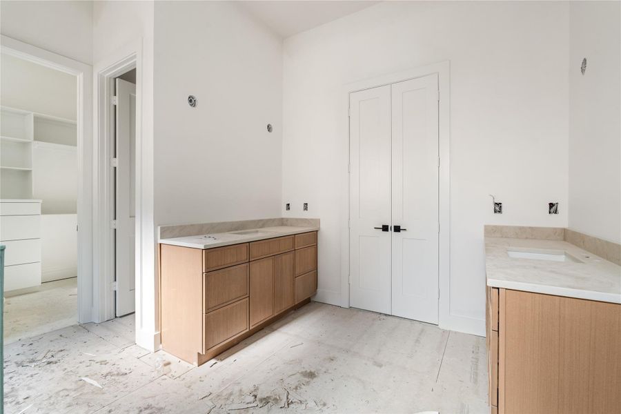 Primary bath has dedicated his/her vanities.