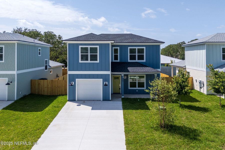 Front exterior of a new home in , St. Augustine, FL, highlighting curb appeal (Image 16).