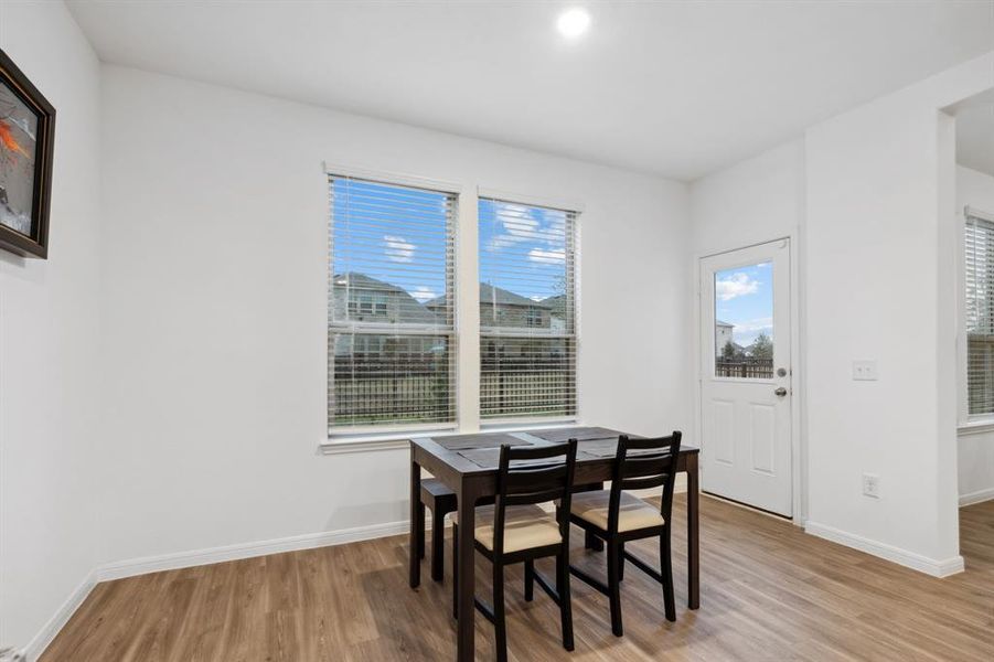 In addition to all the seating around the island, there is more than enough space for a table for 6+ people in this great eat-in dining area.