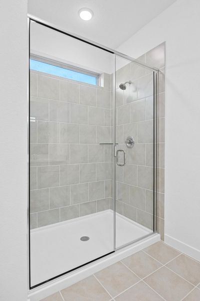 Primary Bath in the Oak home plan by Trophy Signature Homes – REPRESENTATIVE PHOTO Primary Bath in the Oak home plan by Trophy Signature Homes – REPRESENTATIVE PHOTO