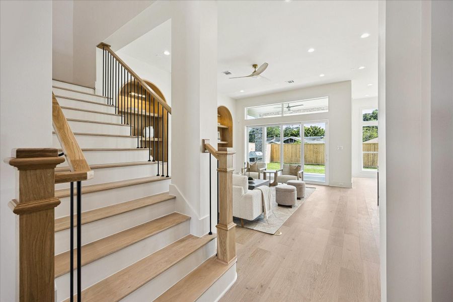 Open, bright and inviting, this home draws you in with warm white oak details, soaring ceilings, clean architectural lines and beautiful natural light. Custom touches at every turn create a polished yet comfortable setting that makes you want to come in, settle down and stay awhile.