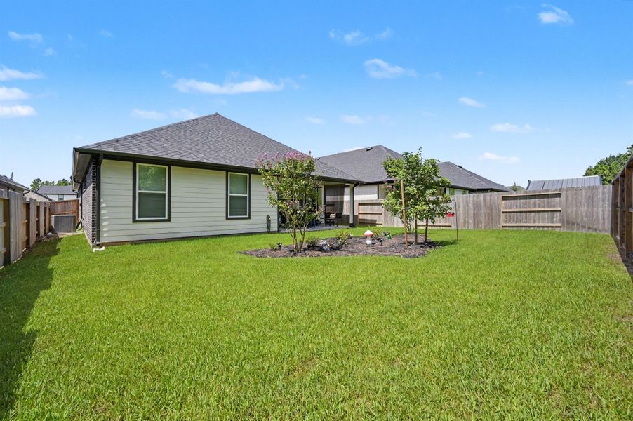 Exterior details and patio area of a home in , Conroe (Image 24). Exterior details and patio area of a home in , Conroe (Image 24).