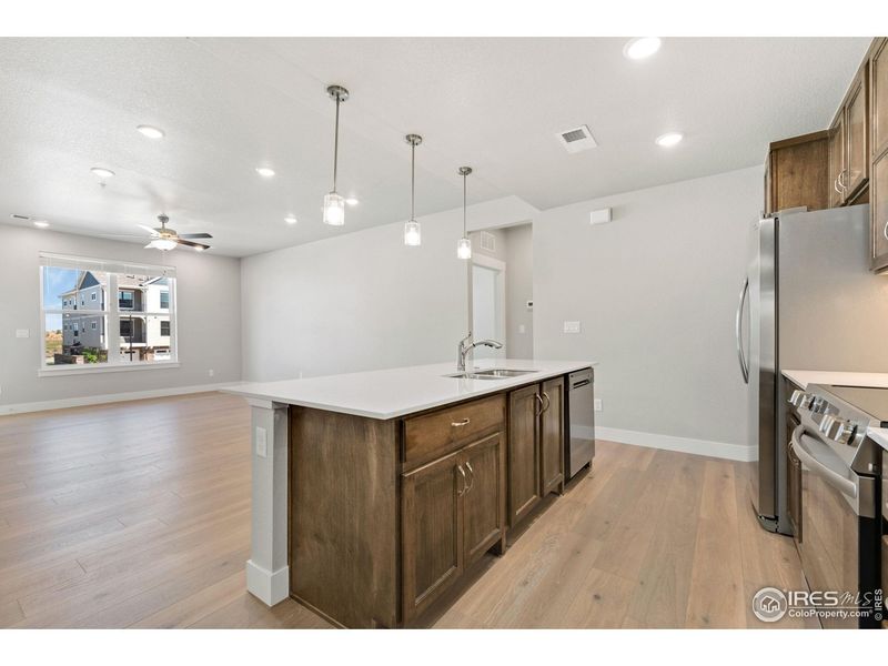 Furnished interior view inside a new home in The Lakes at Centerra - North Shore Flats, Loveland (Image 4).