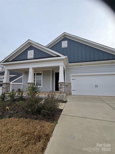 Front exterior of a new home in , Cramerton, NC, highlighting curb appeal (Image 1).