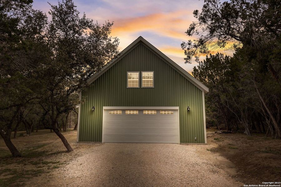 Front exterior of a new home in , Bandera, TX, highlighting curb appeal (Image 27).