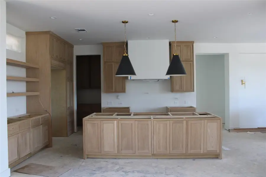 White oak custom cabinets with quartzite countertops. White oak custom cabinets with quartzite countertops.