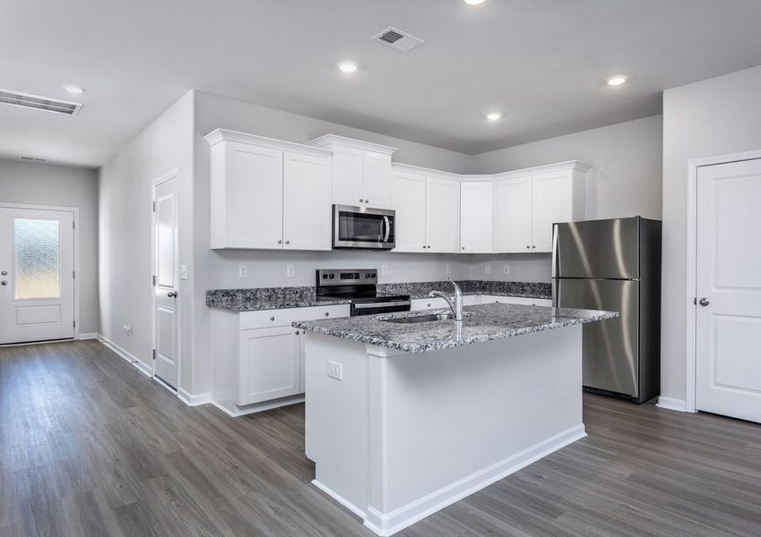 The kitchen has granite countertops