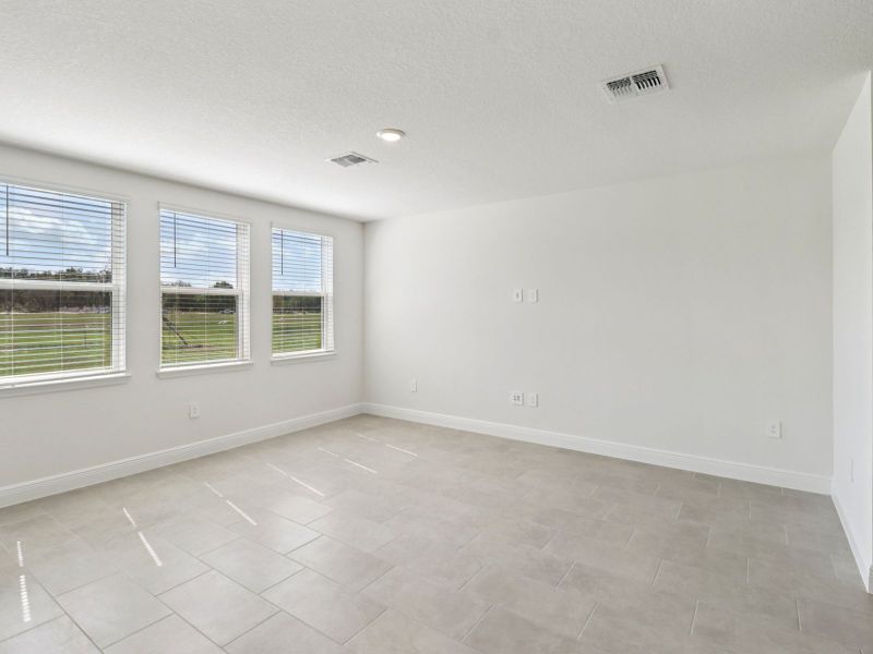 Spacious, unfurnished interior of a new home in The Reserve at Hammock Oaks - Classic Series, Lady Lake (Image 9). Spacious, unfurnished interior of a new home in The Reserve at Hammock Oaks - Classic Series, Lady Lake (Image 9).