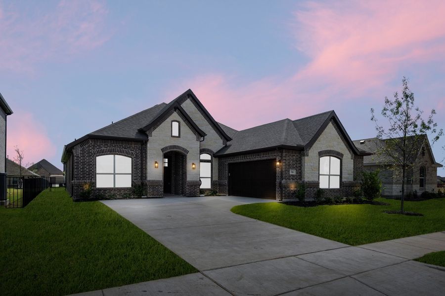Front exterior of a new home in Abe's Landing, Granbury, TX, highlighting curb appeal (Image 2). Front exterior of a new home in Abe's Landing, Granbury, TX, highlighting curb appeal (Image 2).