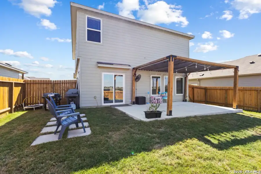 Exterior details and patio area of a home in Legend Pond, New Braunfels (Image 25).