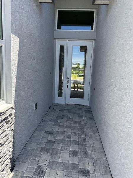 Exterior details and patio area of a home in Valencia Ridge (55+), Wesley Chapel (Image 3).